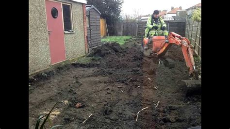 how to level garden mini digger|leveling a garden slope.